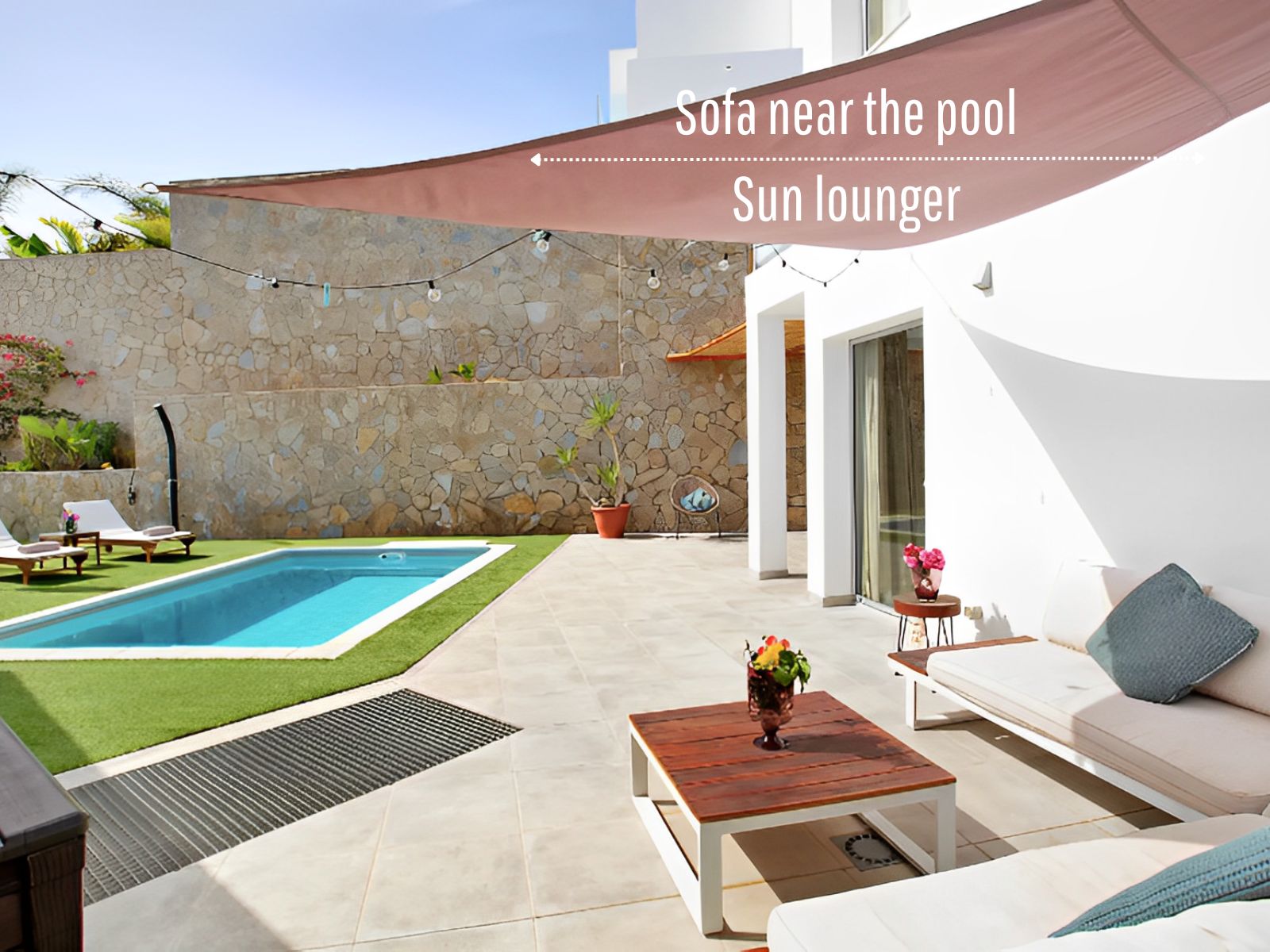 Pool lounge area with sun loungers