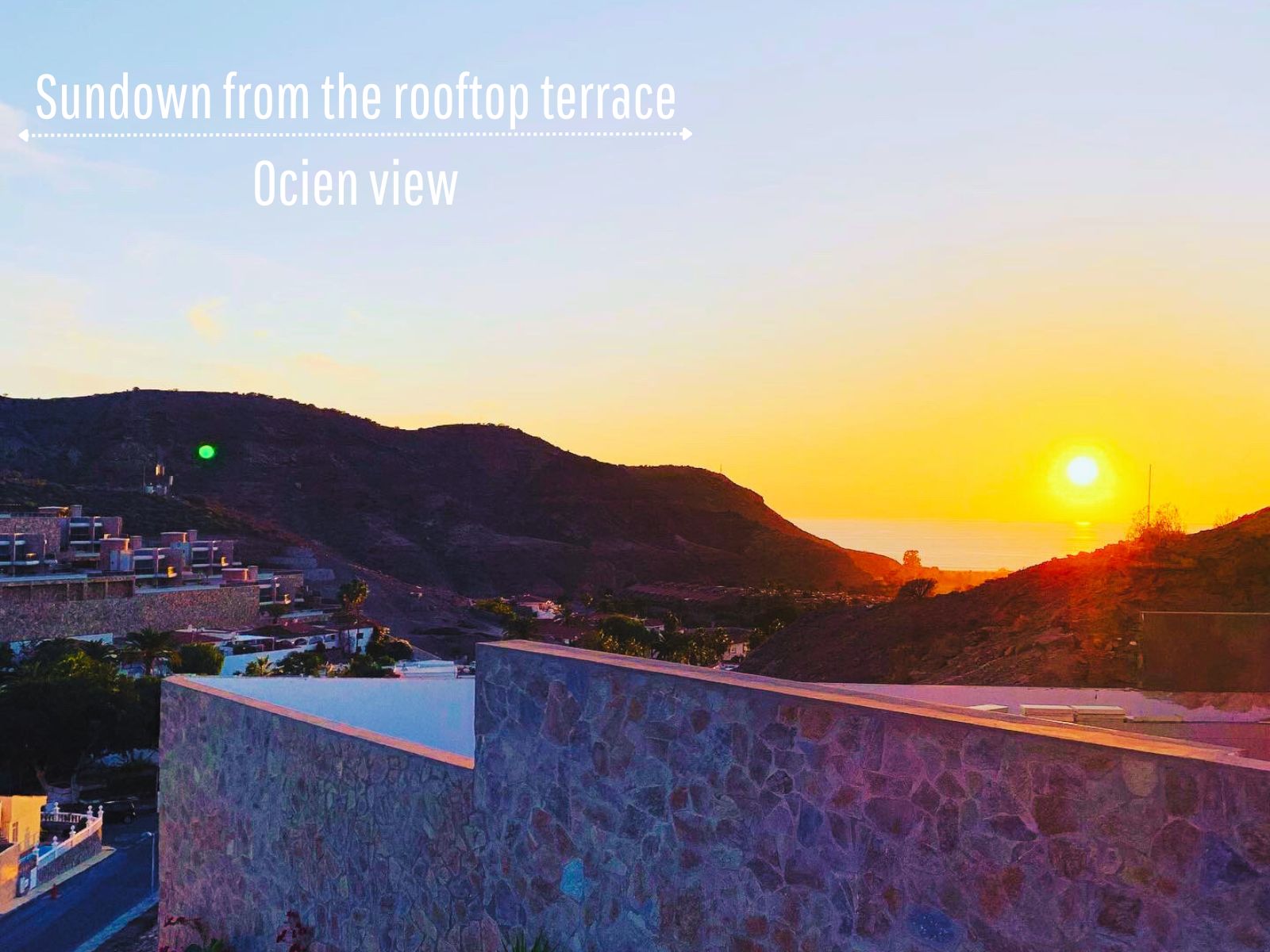 Rooftop terrace with ocean sunset view